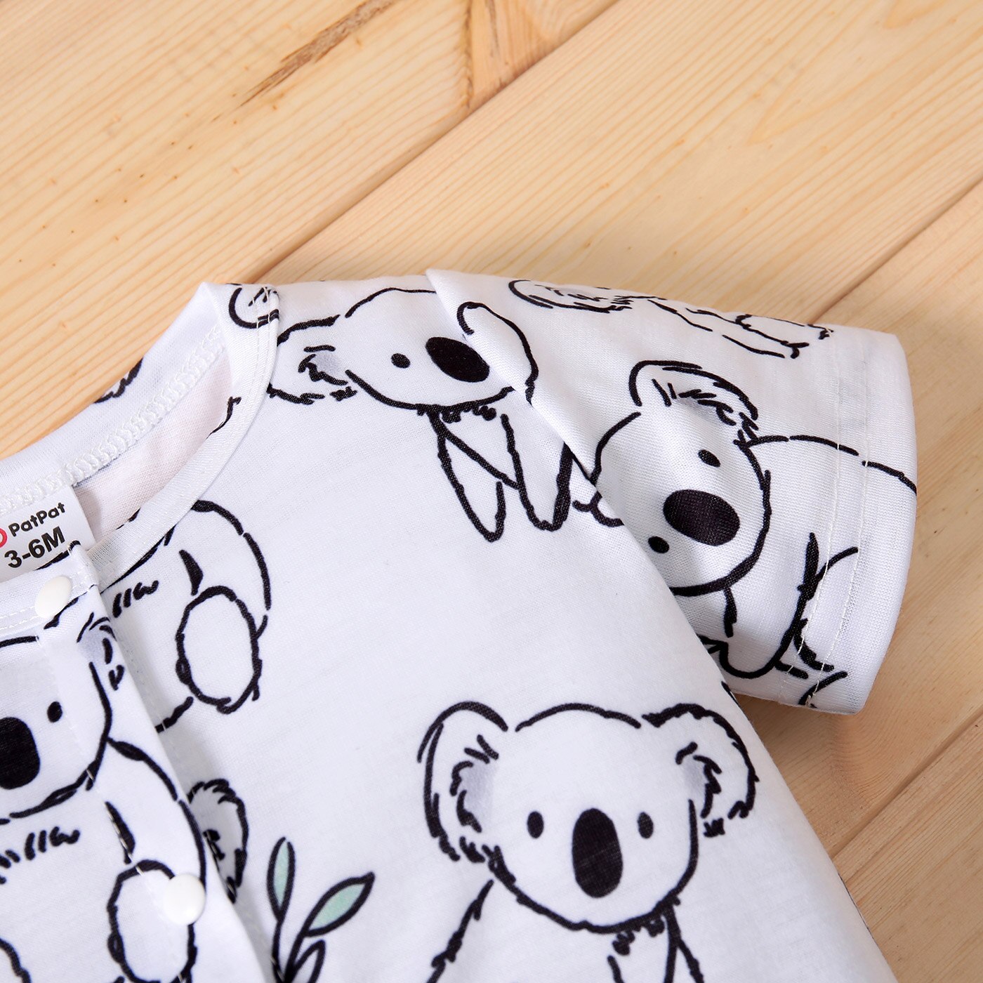 Achetez la Barboteuse Koppa Koala™ à Manches Courtes pour Bébé - Confort et Style Assurés 